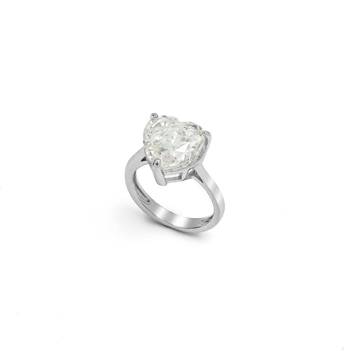 SooSilkyGems A MINIMALIST HEART-SHAPED SOLITAIRE RING.