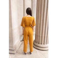 Femponiq Vegan Puff Sleeve Belted Jumpsuit (Burnt Orange)